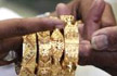 Gold down by Rs 235 to hit 6-month low on falling demand